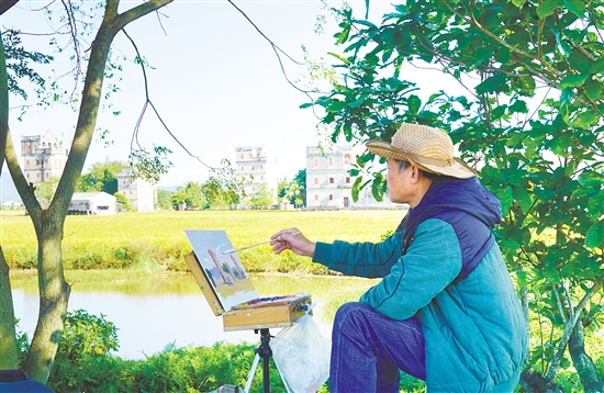 海內(nèi)外美術(shù)家在塘口鎮(zhèn)自力村碉樓群寫生。
